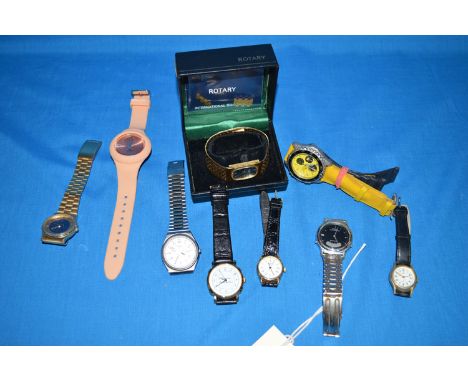 A quantity of costume watches by Rotary, Casio, Lotus, Pulsar and others.