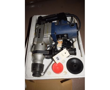 A Ferni hammer drill, model no. FBH-620, in original box.