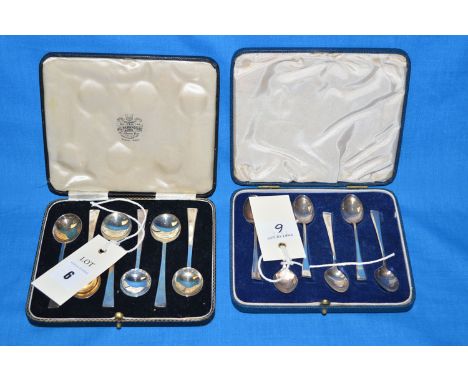 Two sets of six silver tea and coffee spoons, one set by William Hutton & Sons, the other by Thomas Bradbury, both in fitted 