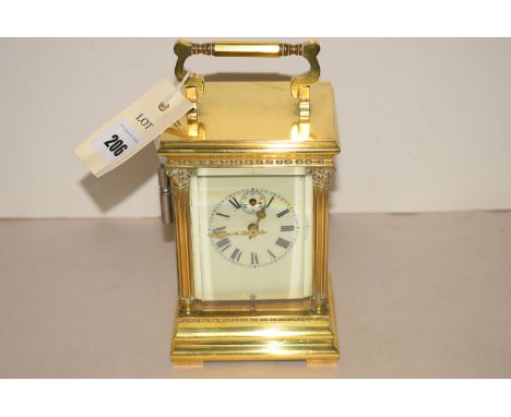 A 20th Century brass carriage clock, roman and subsidiary dial.