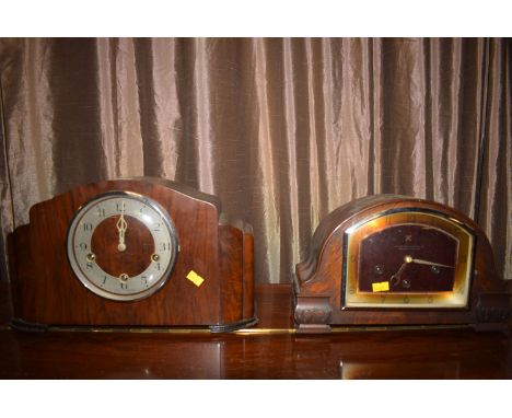 The Northern Goldsmiths Company Art Deco mantel clock with arabic dial, in stained oak case; together with another Art Deco m