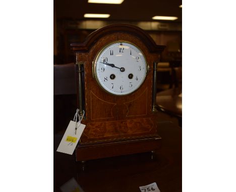 An Edwardian inlaid mahogany mantle clock, the white enamel arabic dial fitted 8-day chiming movement. 