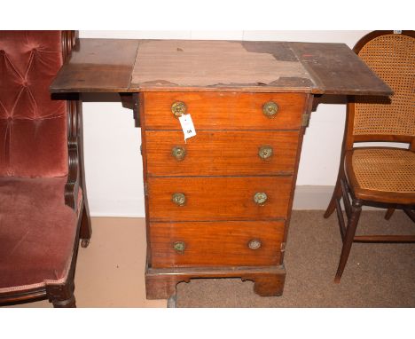 A Georgian mahogany campaign style chest of four drawers with drop leaf sides an raised on bracket feet, 33 1/2 x 23 3/4in. l
