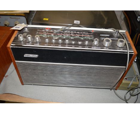 A Hacker Super Sovereign model no. RP75 portable wireless, with original power pack.