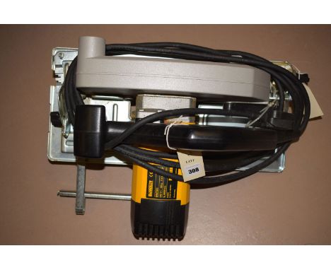 A Dewalt, model no. DW383, electric circular saw.