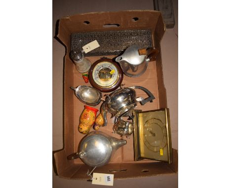 A cut glass sugar shaker with pierced silver top; three-piece plated tea service; a Picquot ware teapot and matching water ju