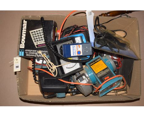 A Black & Decker 170 watt grinder; a Kenlowe volt meter; an electric inspection lamp; a 6/12 volt battery charger; a Bosch bl
