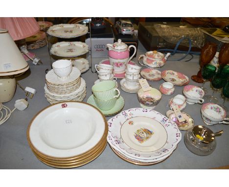 A three-tier plated cake stand with Paragon ceramic plates; a Paragon nine-piece tea-for-two tea set, pattern no. F129611P; a