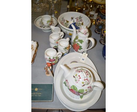 A collection of Portmeirion 'Pomona' and 'botanic Gardens' pattern ceramics, comprising: tea and coffee pots; coffee mugs; mi