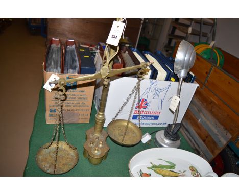 A 19th Century cast brass beam balance and weights; together with a modern aluminium industrial style anglepoise table lamp.