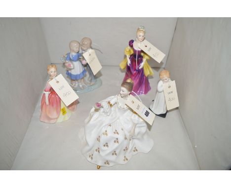 Four Royal Doulton figurines, comprising: HN2339 'My Love'; HN2400 'Debbie'; HN1985 'Darling'; and HN2337 'Loretta'; and anot