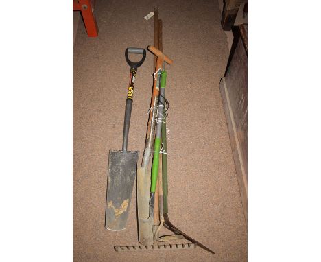 A bundle of garden tools.