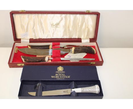 A vintage horn handled carving set &amp; one other knife 
