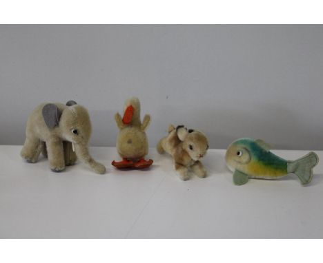 Four vintage miniature 1960's Steiff mohair animals, comprising one elephant (13x10cm), duck, fish &amp; rabbit (sold as seen