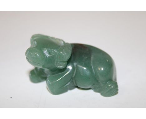 A small Chinese jade buffalo 