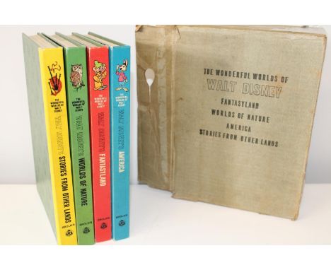 A box set of four vintage Walt Disney books by Grolier 