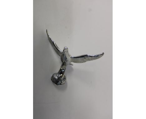 A vintage bird form car mascot 14x10cm 