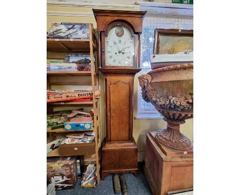 An early 19th century oak and mahogany eight day longcase clock,&nbsp;the 13in painted arch dial inscribed&nbsp;'W Robson, N 