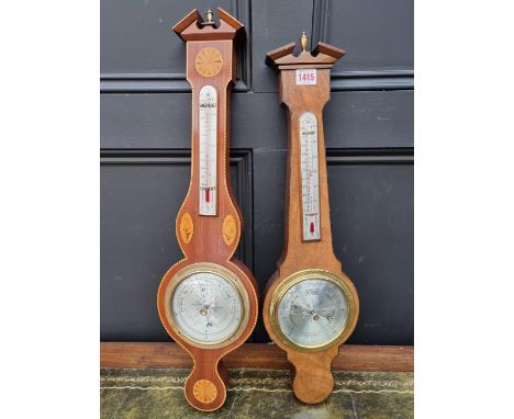 Two reproduction banjo barometer, to include an example by Comitti of London, largest 65cm high.&nbsp;&nbsp; 