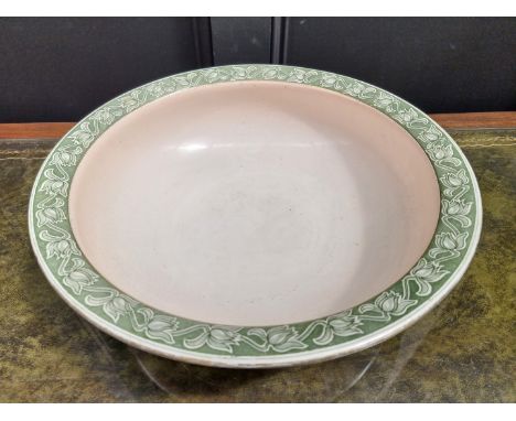 A large Art Nouveau pottery 'Poppy' pattern basin, 42.5cm diameter. 