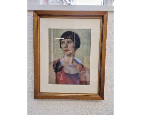 English School, circa 1920s, head and shoulders portrait of a lady, pastel, 47 x 35.5cm. 