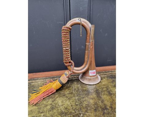 An old copper and brass bugle.&nbsp; 