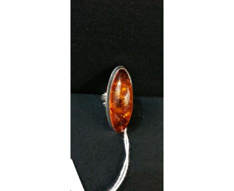 LARGE SILVER AND AMBER RING