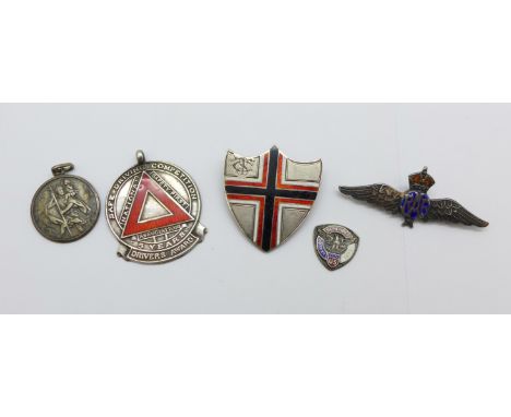 A silver RAF sweetheart brooch, a silver and enamel cross brooch, a silver fob, a St. Christopher pendant and a small silver 
