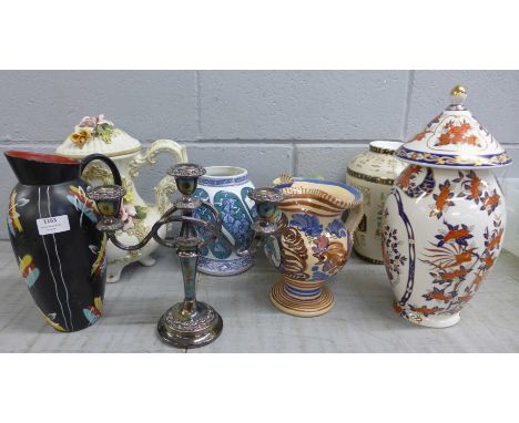 Six vases, jugs and pots and a plated candelabra **PLEASE NOTE THIS LOT IS NOT ELIGIBLE FOR POSTING AND PACKING** 