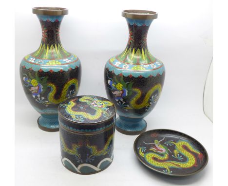 A pair of Chinese cloisonne vases, 23.5cm, and a Chinese cloisonne pot, 10cm, with cover and dish, all enamelled with dragons