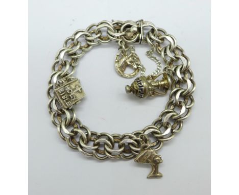 A silver charm bracelet, 37g 