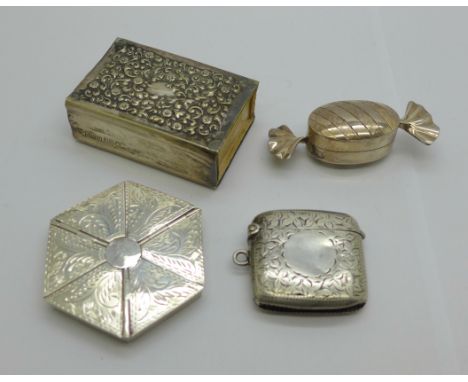 Two hallmarked silver pill boxes including one hexagonal shaped and with six compartments, a plated matchbox cover and a silv