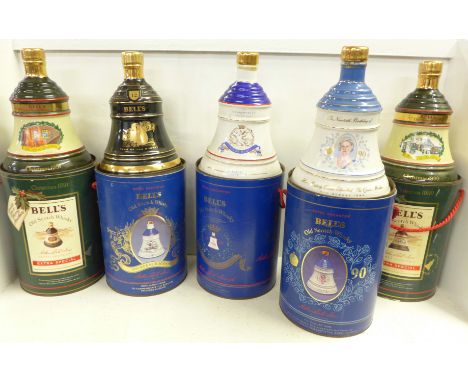 Five Bell's Old Scotch Whisky decanters in containers; two Extra Special 