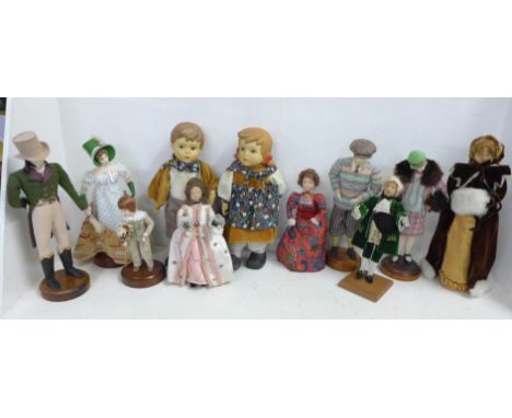 A pair of Goebel style boy and girl dolls, 26cm and Teresa Thompson and other dolls 
