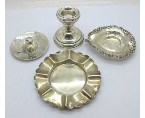 Two silver dishes, a silver candle holder and a novelty 925 silver hat, weight without candle holder 54g, pierced dish a/f 