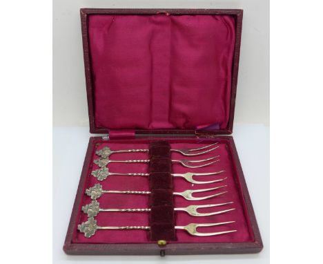 A set of six silver olive forks, boxed, 44g 