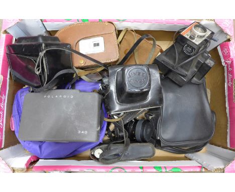 A collection of cameras including Polaroid, Zenith, Kodak, etc. **PLEASE NOTE THIS LOT IS NOT ELIGIBLE FOR POSTING AND PACKIN