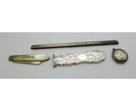 A silver cased watch, a/f, a Victorian silver handle, a silver comb back and a silver and mother of pearl fruit knife 