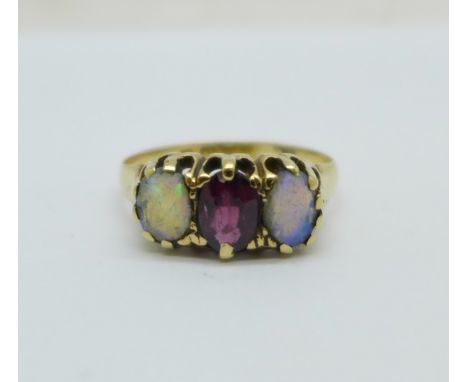 An 18ct gold, amethyst and opal ring, Birmingham 1907, 3.7g, N 