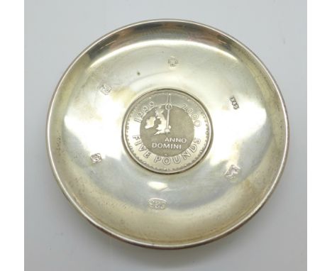 A silver dish set with £5 coin insert 