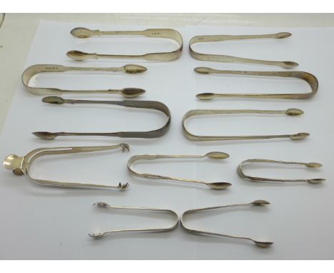Ten pairs of silver sugar tongs, 284g, and one plated pair 