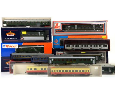 Thirty H0/00 gauge Fleischmann, Tri_Ang, Liliput, Jouef and other carriages, mostly in wrong boxes,PROVENANCE: From a decease