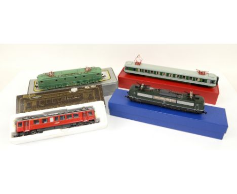Four locomotives of various makers, comprising Bemo HO Narrow Gauge Ge4/4 Electric ABe4/4 Railcar in red livery, Roco H0 gaug