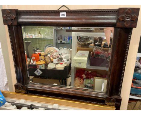 OAK BEADED MOULDED FRAMED MIRROR WITH CARVED CROSS BOSSES TO THE CORNERS 