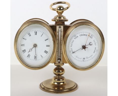 A late 19th century brass desk combination barometer and clock, white enamel dial with Roman numerals, barometer with white e