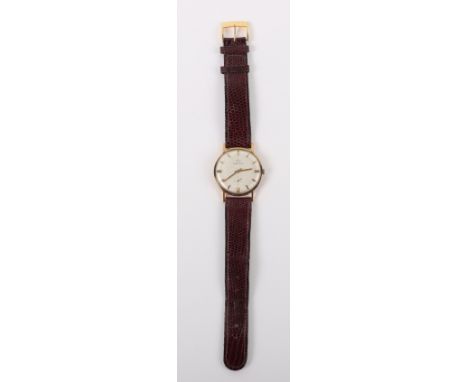 A vintage 9ct gold Marvin wristwatch, circa 1950, silvered dial with baton and subsidiary dial