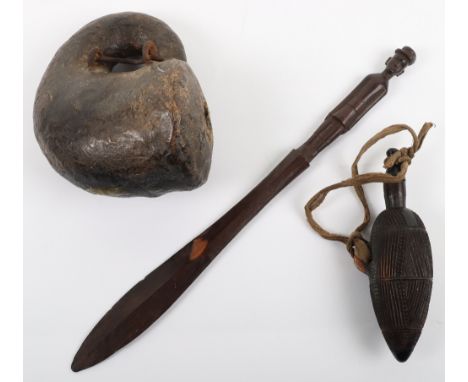 A Boer war ceremonial wood dagger, with carved Boer soldier as hilt, 37cm, with a fine carved African wood powder flask, and 