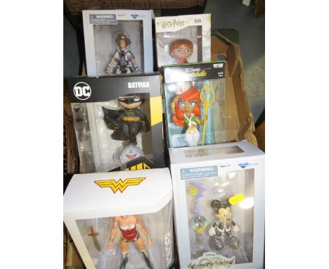 A box of boxed figures, Harry Potter etc