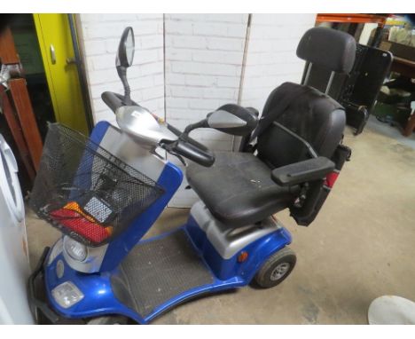 An Elite mobility scooter with key and charger - House clearance