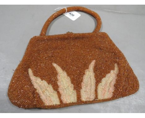A vintage bead clasp handbag